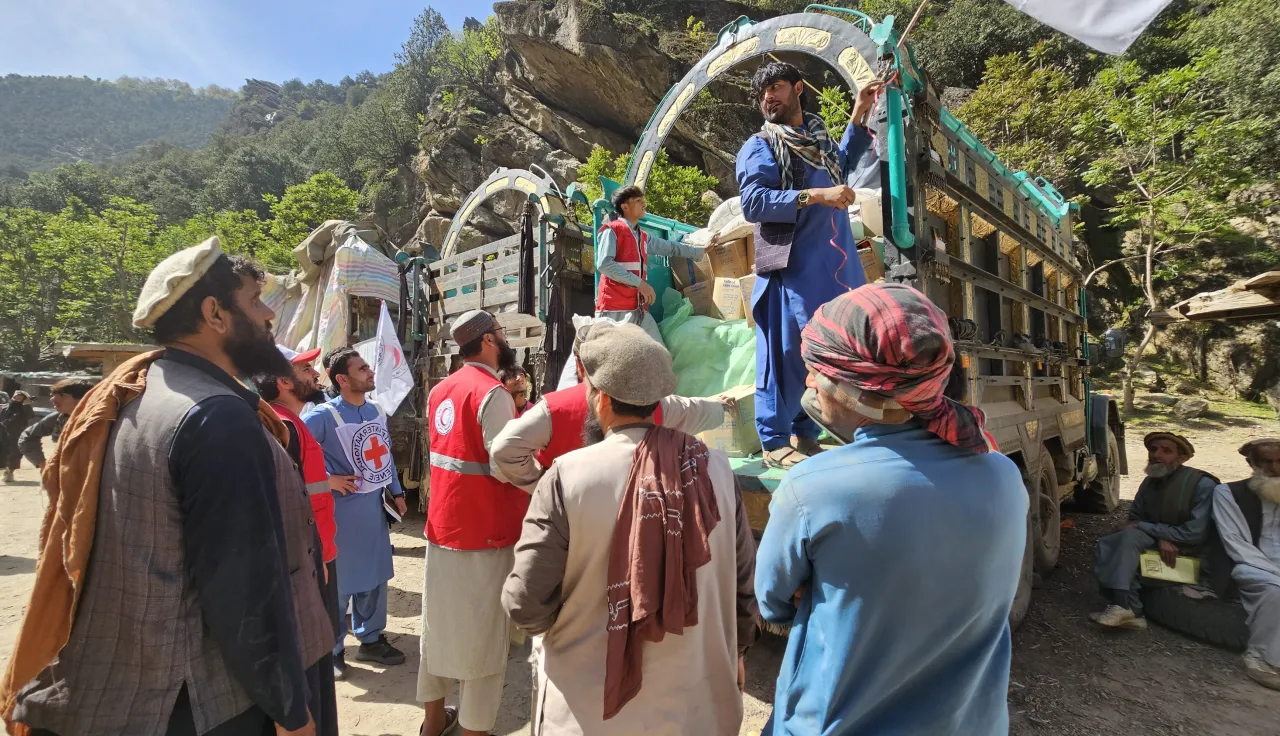 Humanitarian teams unloading aid supplies in Afghanistan